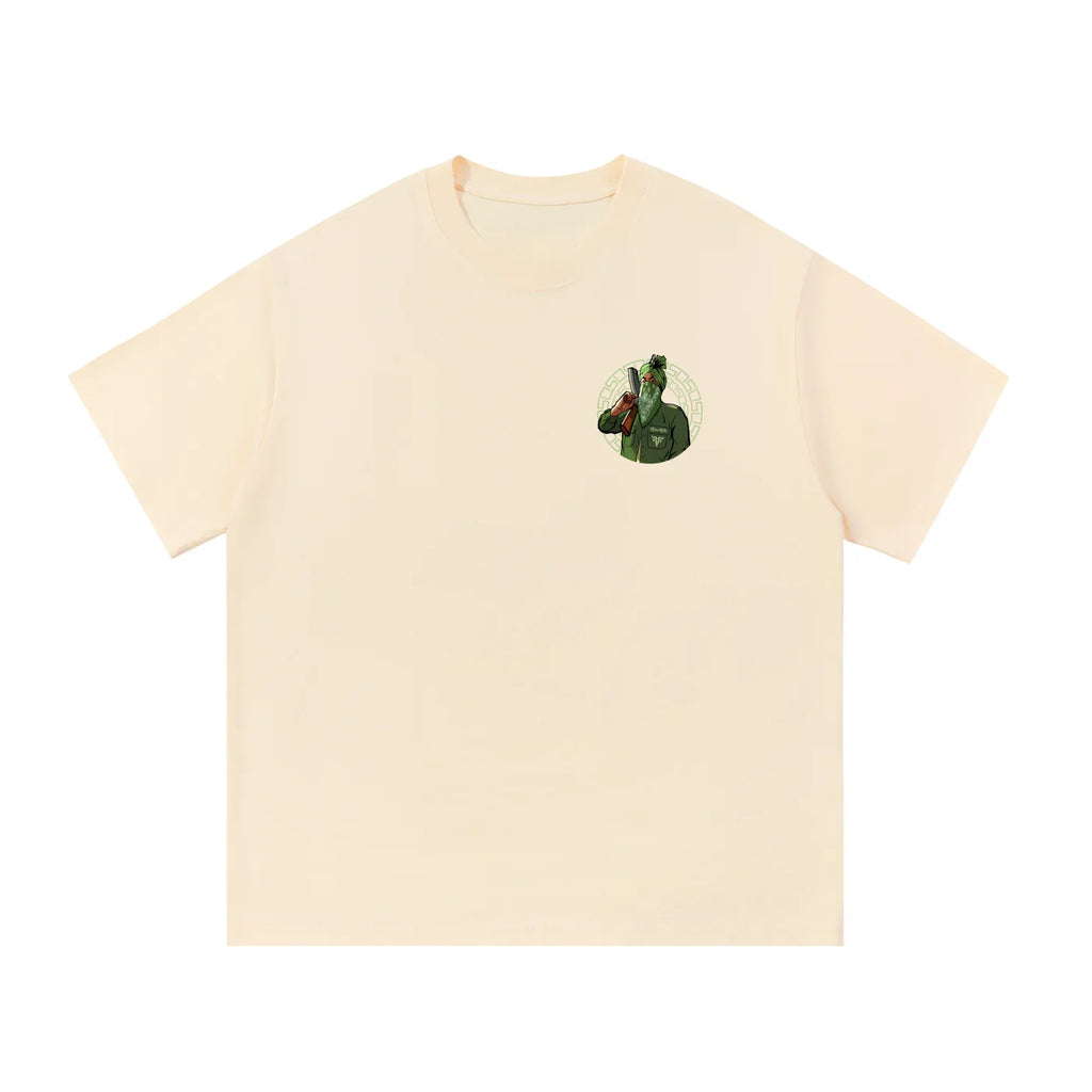 Beige oversized streetwear t-shirt with small green graphic of a man in turban on chest