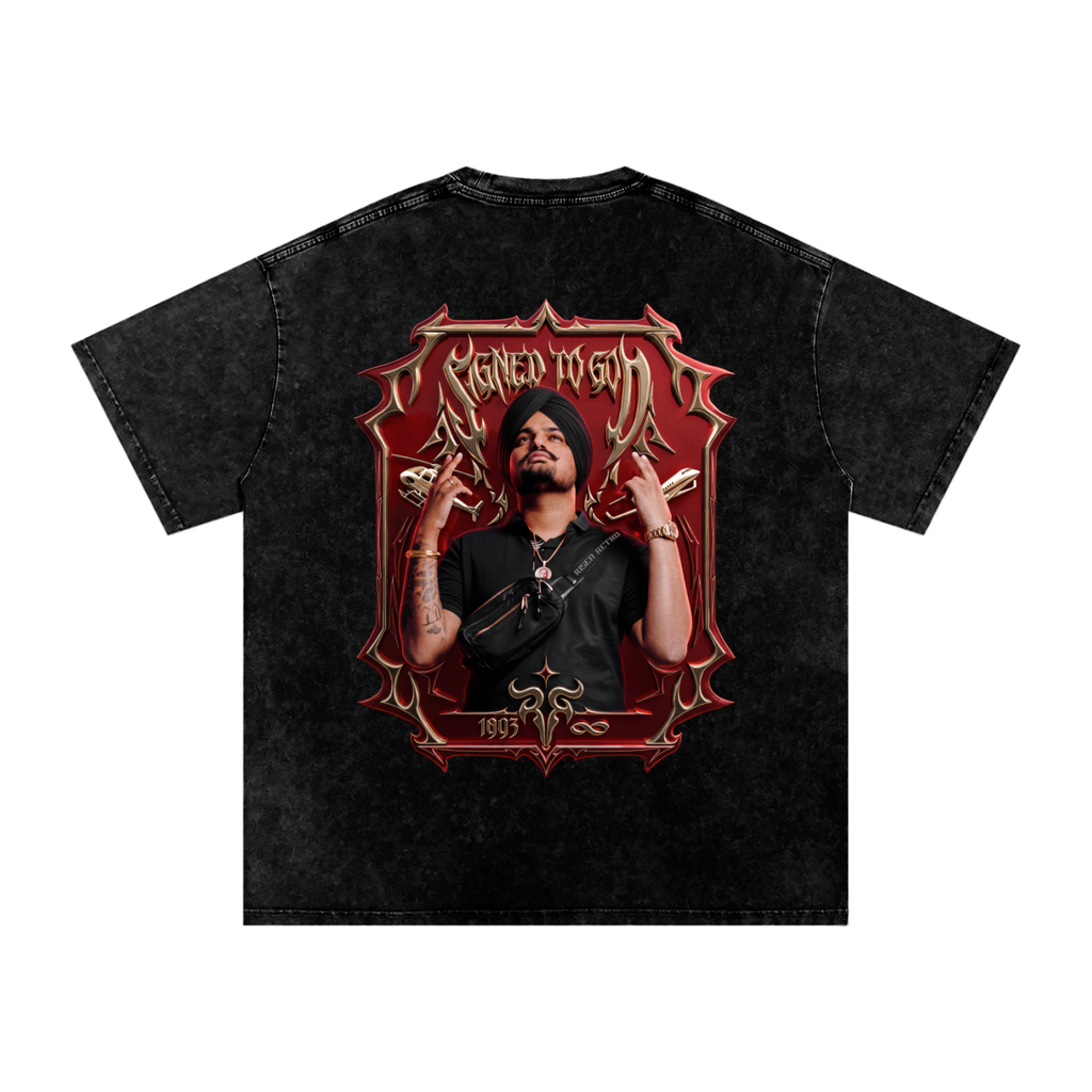 A black acid-wash t-shirt featuring a large back graphic of a sidhu moose in a black TURBAN and black shirt, framed by a red gothic border with the text 'SIGNED TO GOD' and '1993'.