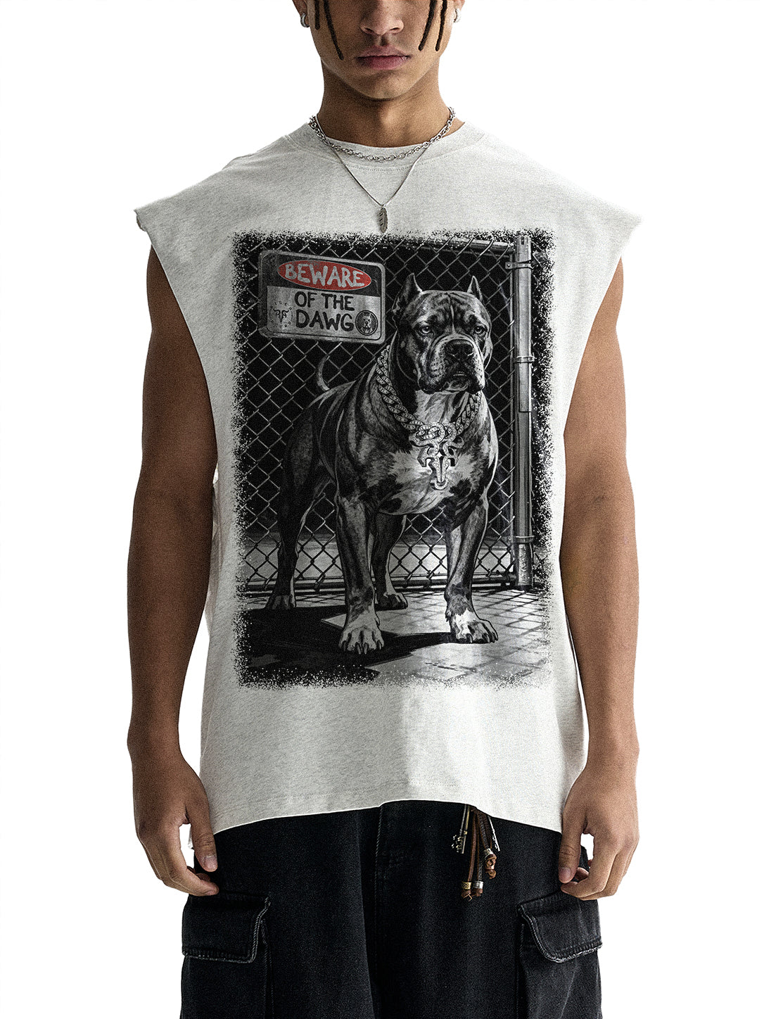 A sleeveless white t-shirt with a black and white graphic print of an American Pitbull dog behind a chain-link fence, worn by a model.