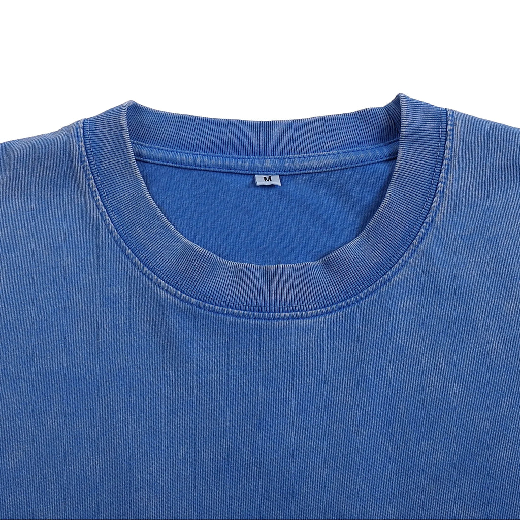 Close-up of a blue shirt collar on a white background