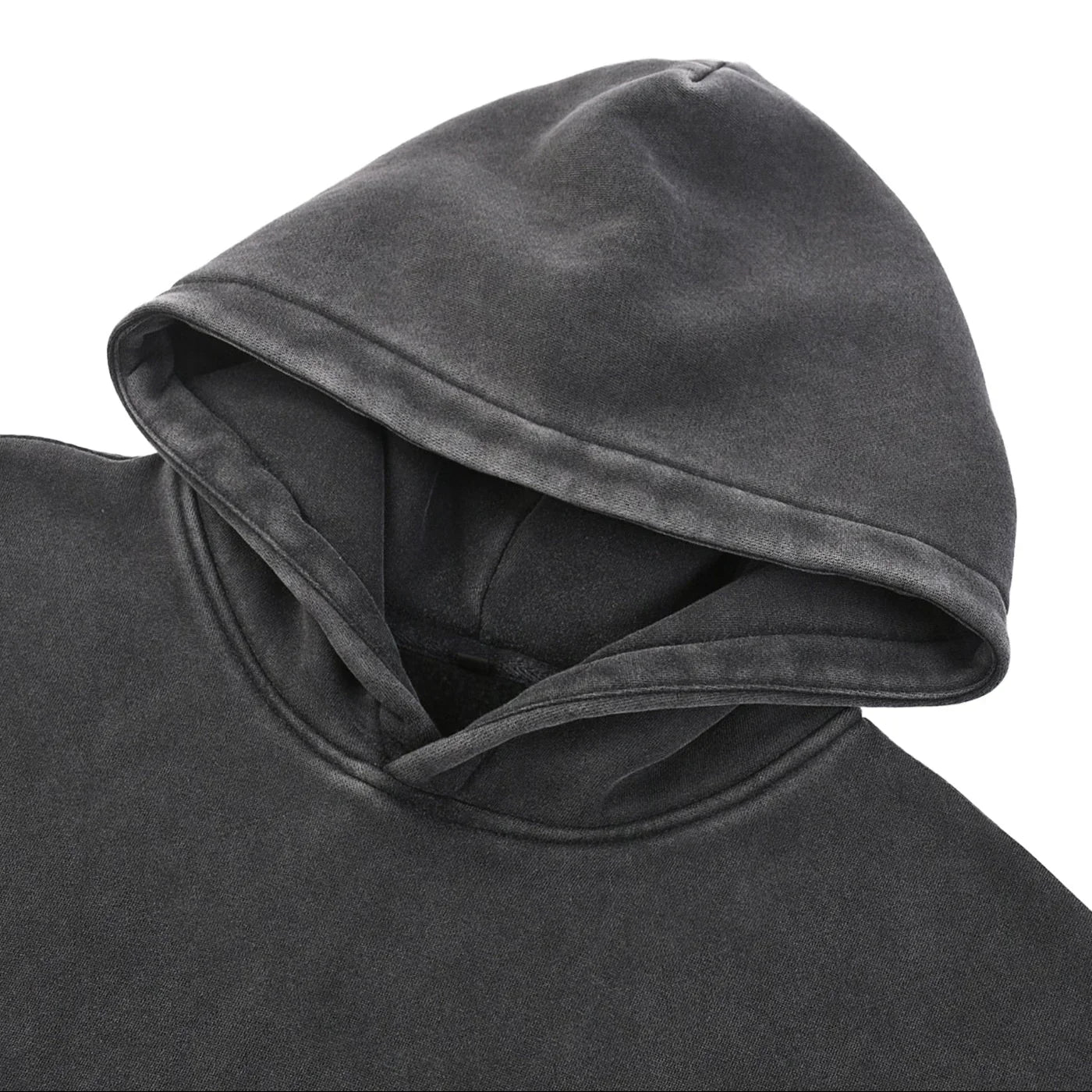 Close-up of a dark gray hooded garment on a white background