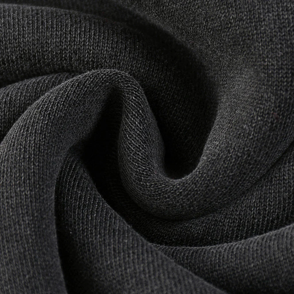 Close-up of dark gray fabric with a textured pattern